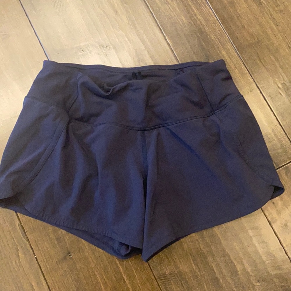 navy size 4, 4 inch lululemon speed up shorts